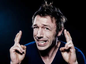Funny Man Portrait with crossed fingers
